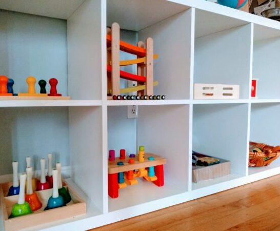 Montessori open toy shelves for toddlers for independent play.