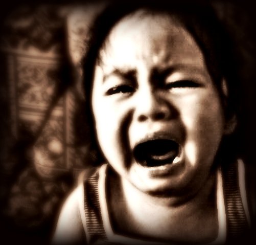 black and white image of toddler crying, tips for tantrums and meltdowns.