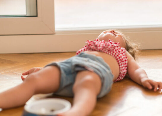 child crying on floor, tips to avoid tantrums and meltdowns.