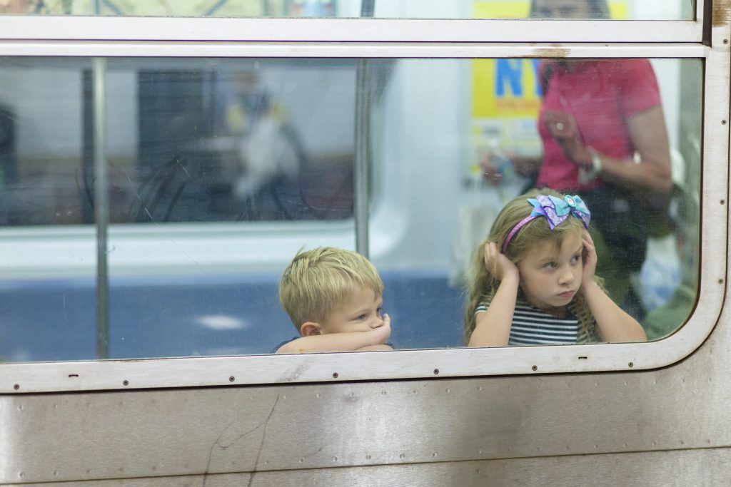Two kids on train, is boredom bad for kids?