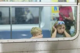 Two kids on train, is boredom bad for kids?