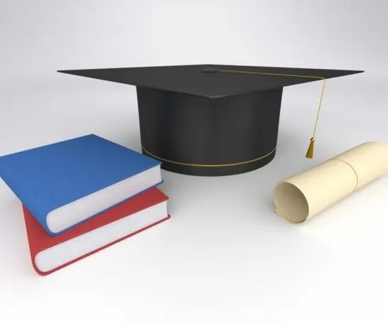graduation cap, diploma and books. Which Montessori Training is Best?