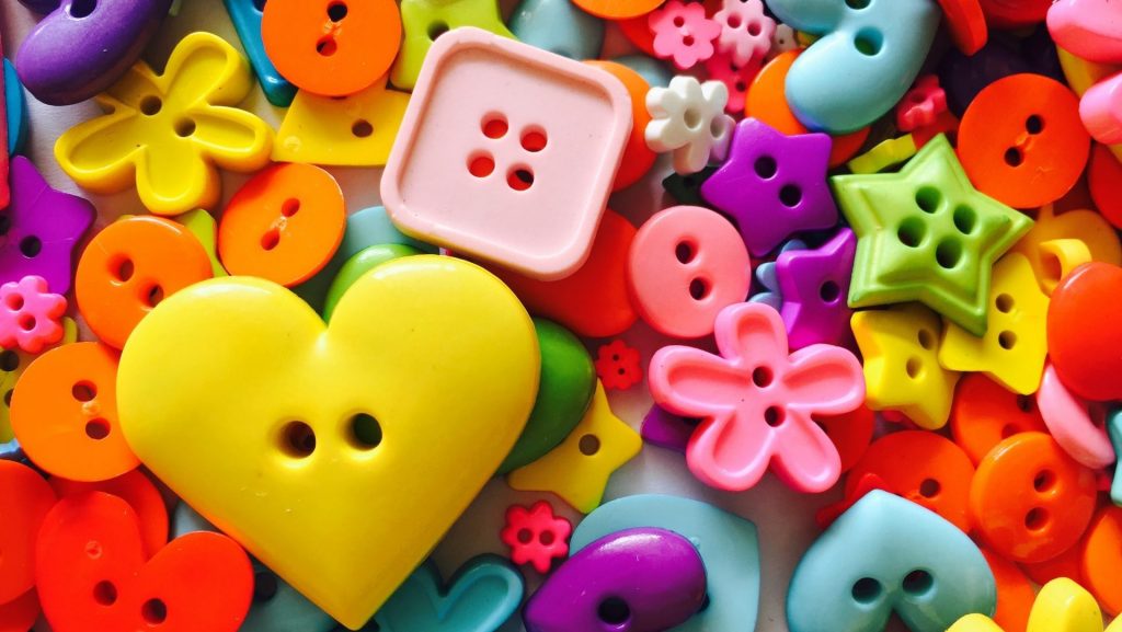 Assorted buttons for loose parts play.