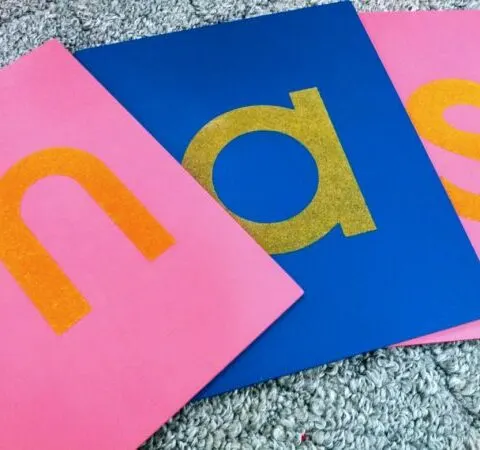 how do Sandpaper Letters work? close up photo of sandpaper letters.
