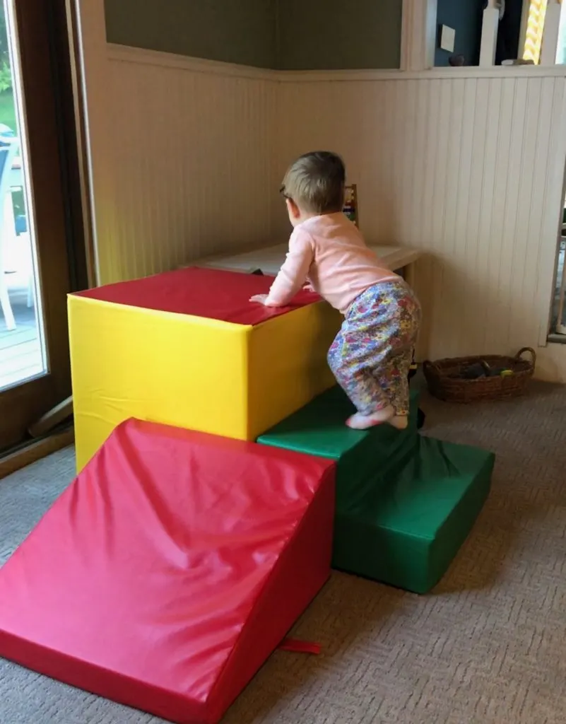 gross motor development baby climbing