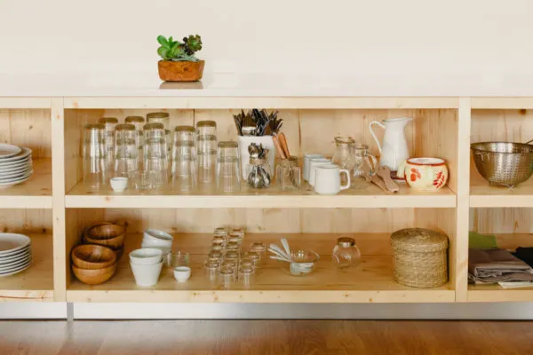 shelf containing glass items.