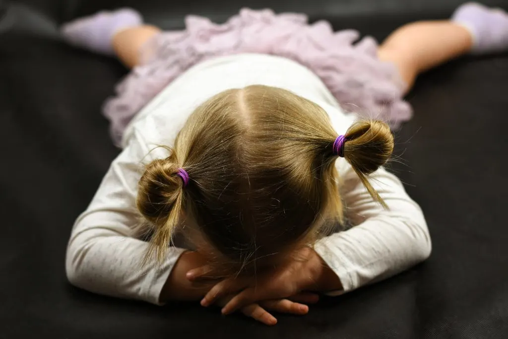 toddler throwing tantrum, in need of positive discipline