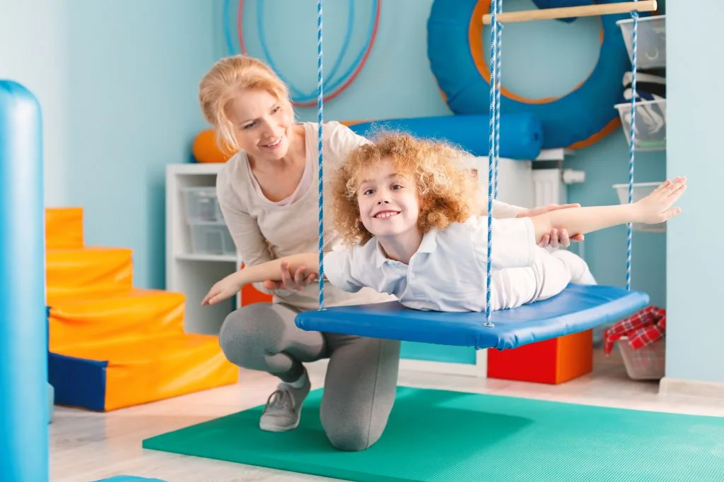 child in occupational therapy setting