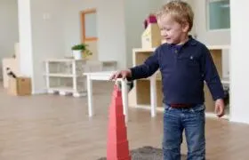 Child working with the Montessori Pink Tower