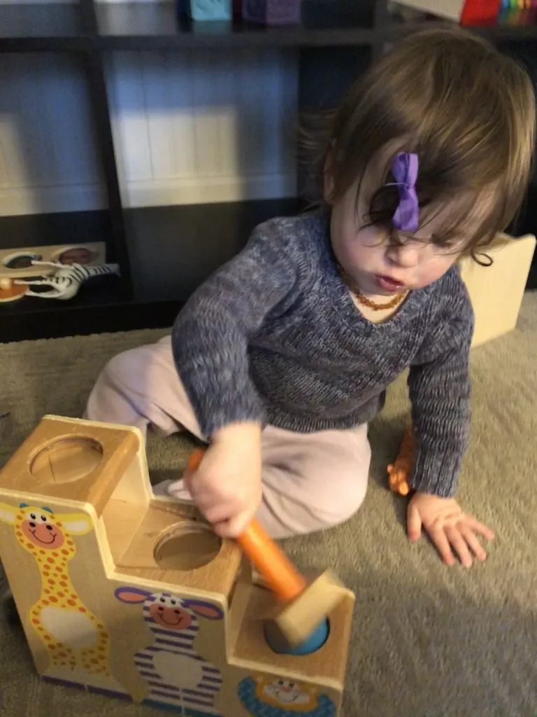 Pounding toy with hammer