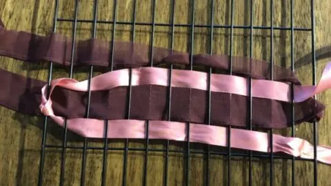 DIY weaving activity, good for connection play schema.