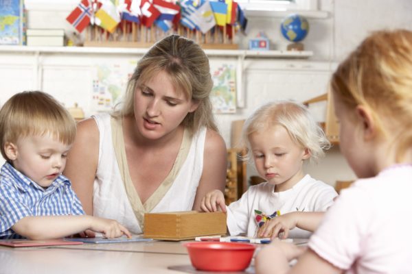 Montessori teacher, giving a presentation