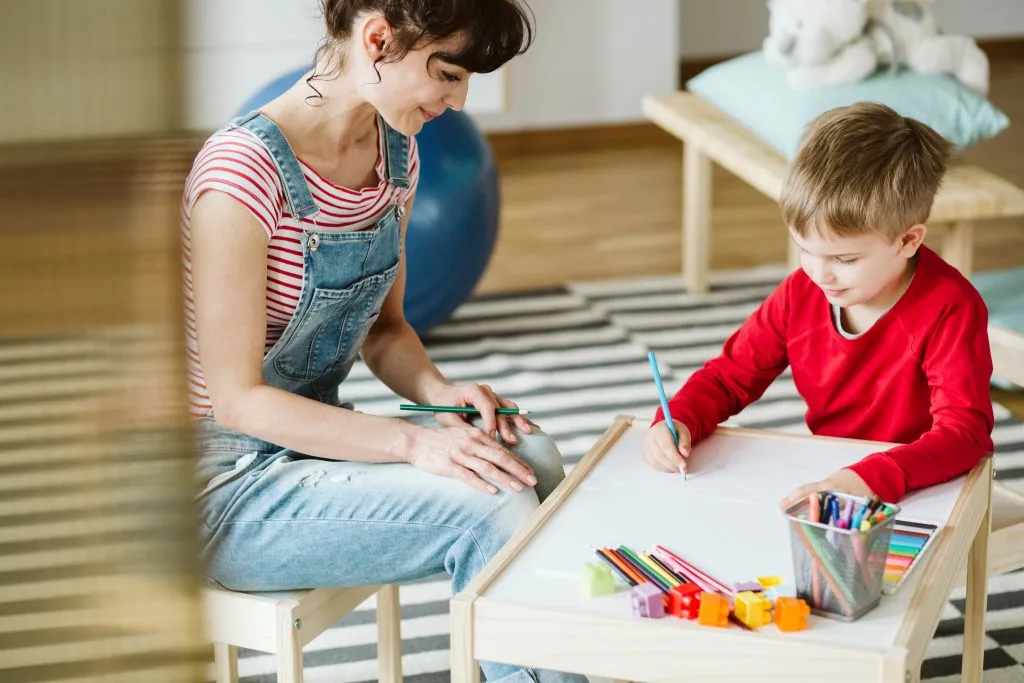 Teacher working with ADHD student