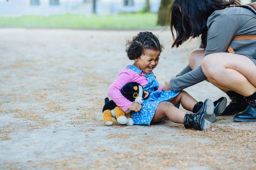 instead of "you're ok" image of little girl who has fallen and mother comforting her.