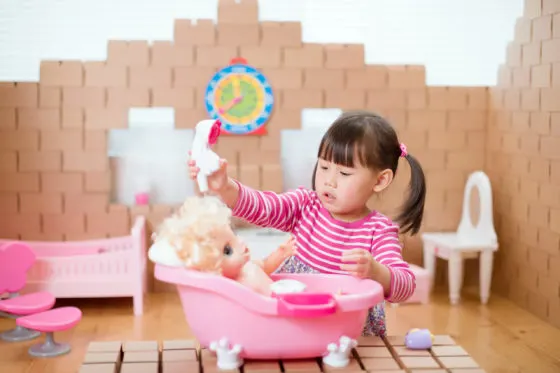 Toddler washing doll