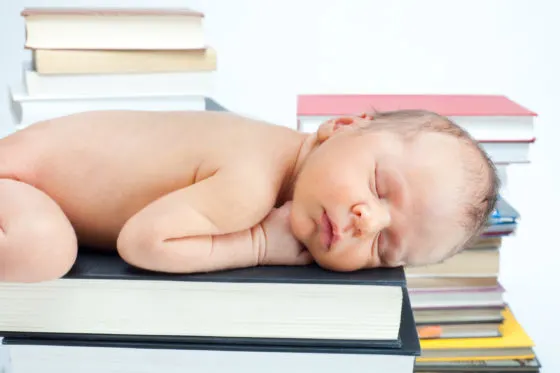 Montessori baby on books.