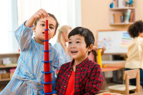 children being creative with Montessori materials.