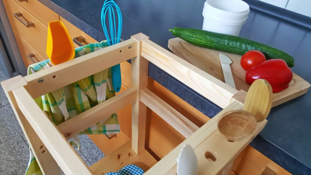 montessori learning tower and utensils.