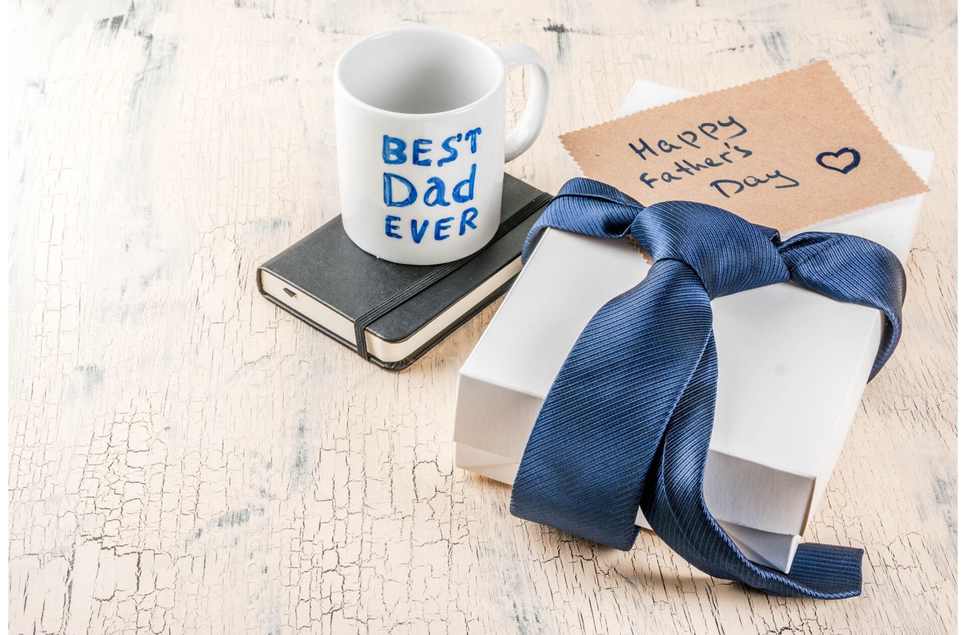 father's day crafts for toddlers and preschoolers image of gift box, wrapped in blue tie and best dad ever mug.