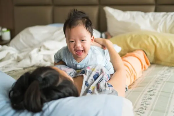 image of baby on mother's chest as an alternative to tummy time.