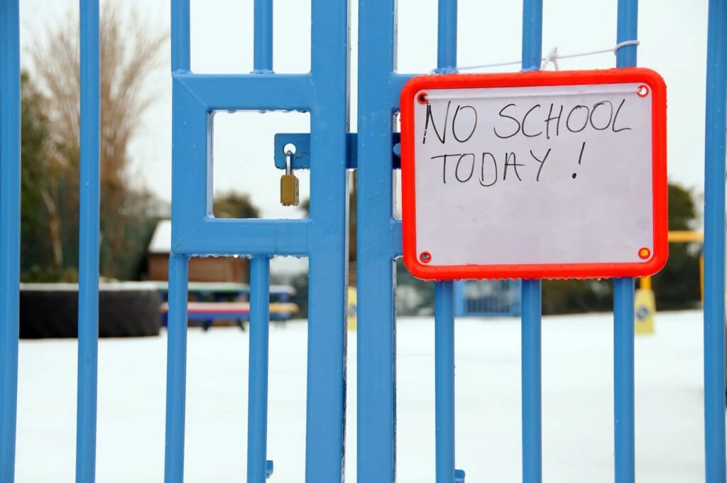 image of locked montessori school gate.