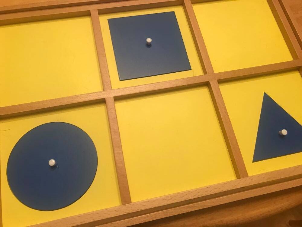 image of the Montessori Geometric Cabinet demonstration tray.