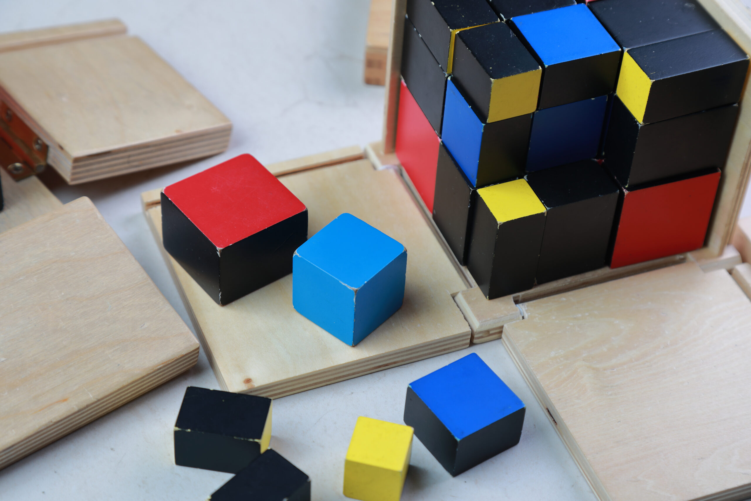 The Montessori Binomial Cube: Purpose and Presentation — The Montessori-Minded  Mom