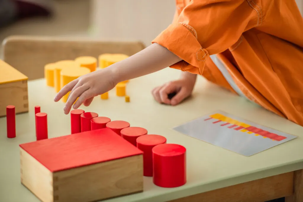 The Montessori Knobless Cylinders: Purpose and Presentation — The