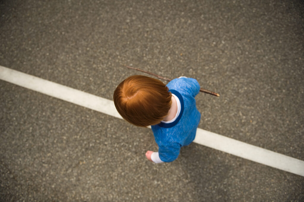 image of child walking the line Montessori style.