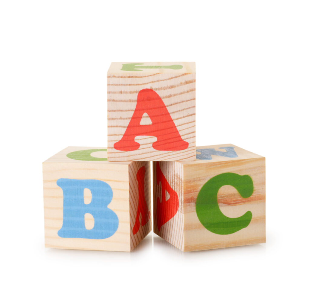 image of a b c blocks used in letter a activities.