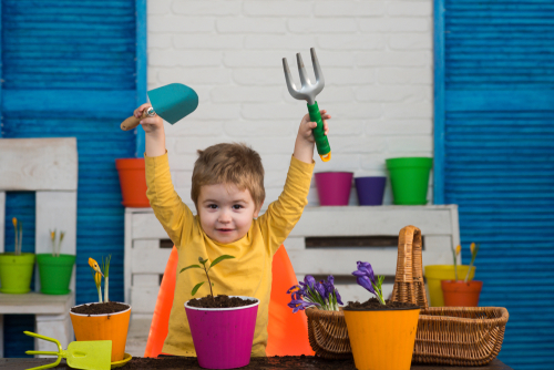 image of child using gardening sets for toddlers.