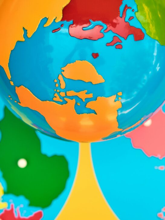 Image of Montessori geography materials, the colored globe and the continent map puzzle.